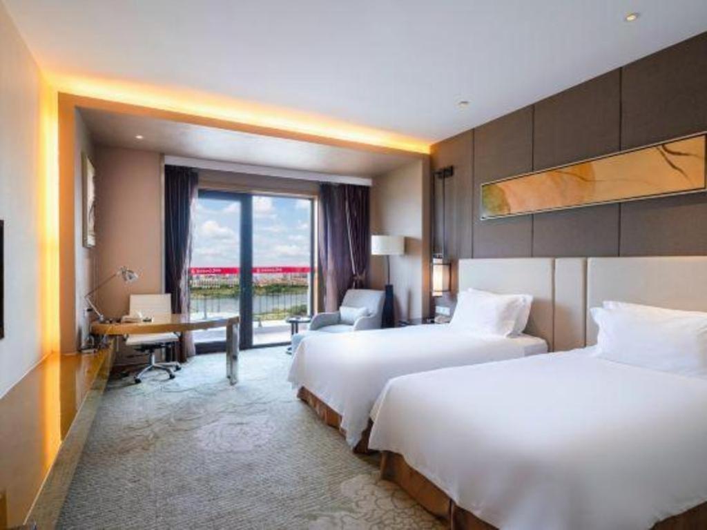 Haiyang Shenglong Jianguo Hotel Hai-yang-hsien Exterior foto